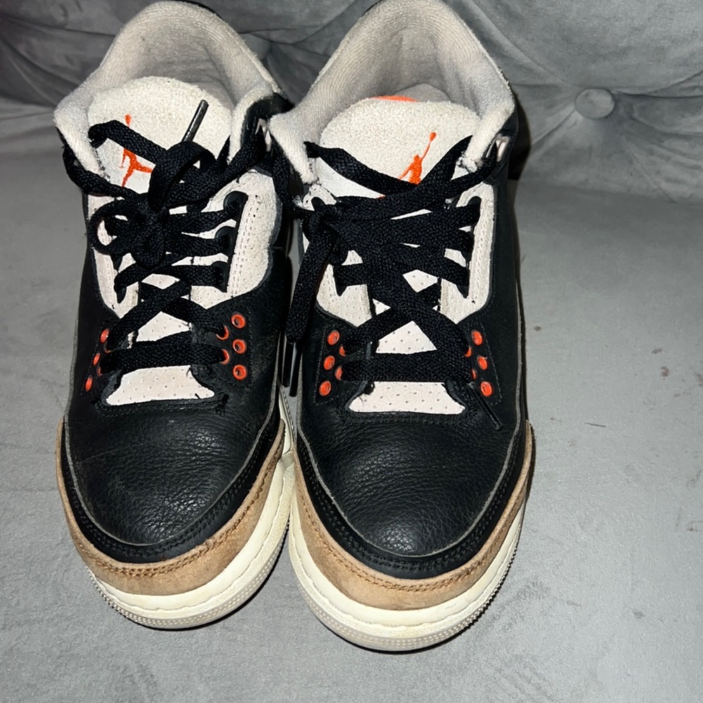 Jordan sneakers “authentic” moderately worn by school aged boy.